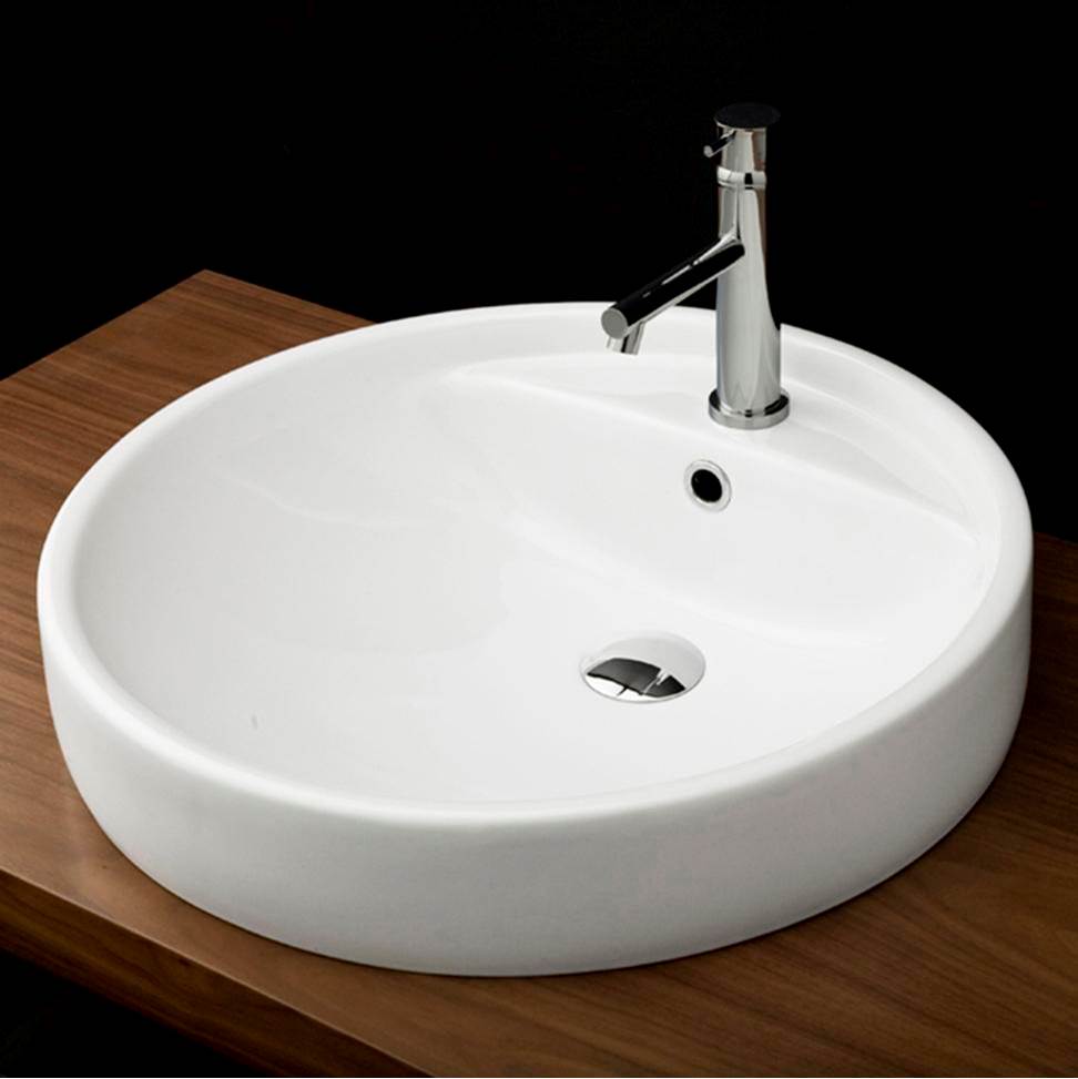 Lacava Self-rimming porcelain Bathroom Sink with one faucet hole and an overflow. DIAM: 18 1/2''
H: 6 1/4''